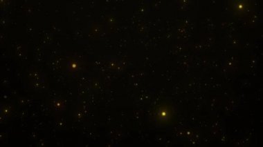 Altın parıldayan yıldız ışığı ve arka planda yüzen bokeh. Soyut hareket arka planı altın parçacıkları parlıyor. Parıldayan parçacıklar. Kusursuz 4K döngü video canlandırması.