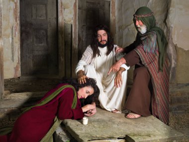 Mary of Bethany crying of shame and anointing Jesus' feet, while Judas is protesting against the waste  clipart