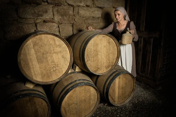 Woman Medieval Peasant Outfit Checking Wine Barrels Cellar Property Released — Stock Photo, Image