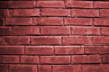 Kırmızı ışığı olan soyut bir duvar. Duvar yüzeyinin dokusu. Tuğla arkaplanı