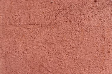 Güzel, eski, çatlak kırmızı duvar dokusu. Soyut kırmızı boya arkaplanı