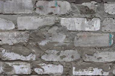 Güzel beyaz tuğla duvar dokusu. Eski çatlak beyaz duvar arkaplanı