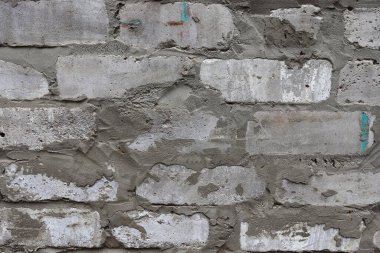 Güzel beyaz tuğla duvar dokusu. Eski çatlak beyaz duvar arkaplanı