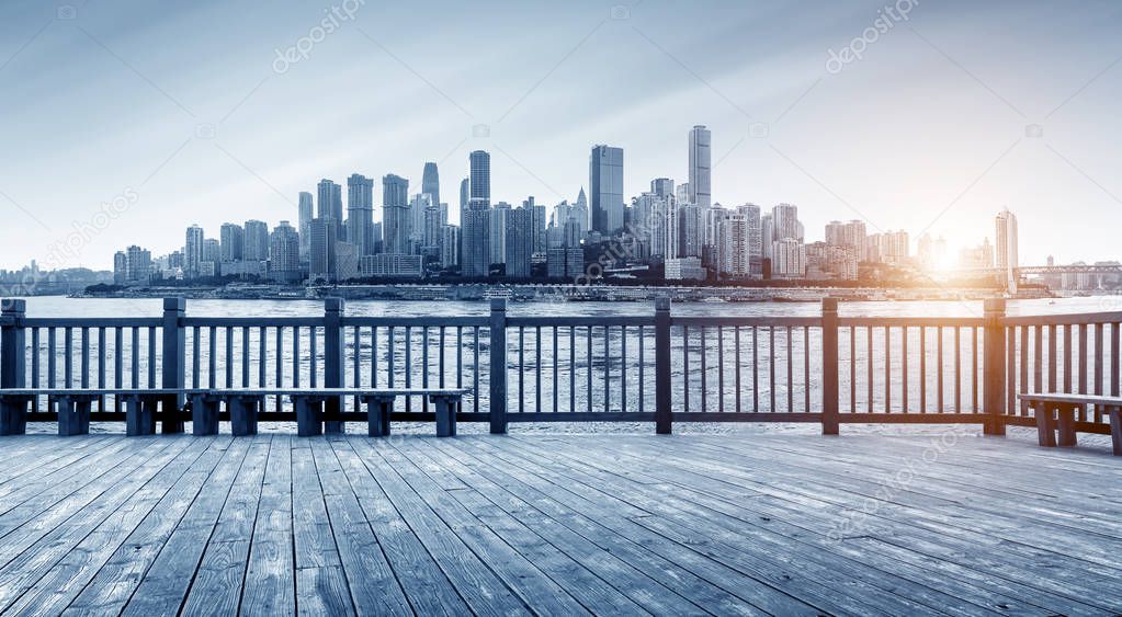 Chongqing city skyline, with wooden floors and guardrails.