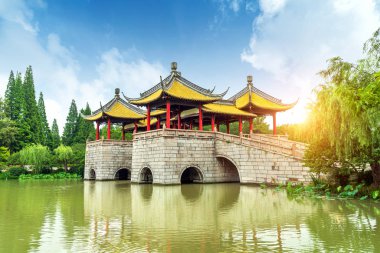 ive Pavilion Bridge (Also known as lotus Bridge) on the Lender west lake. The Chinese texts on the bridge meaning are lotus bridge.Slender west lake is a well-known scenic spot in China. clipart
