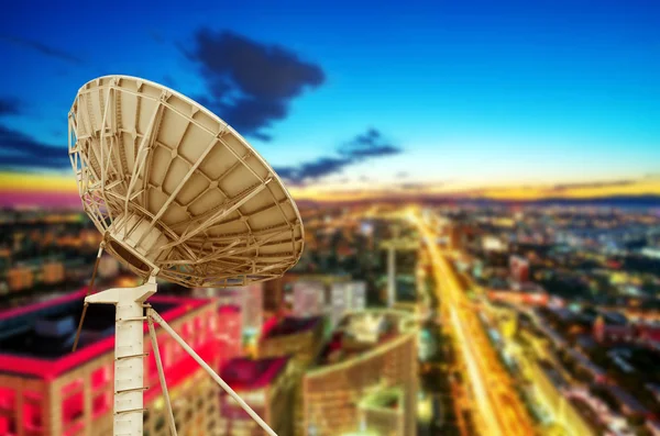 Satellite antenna in the tall buildings of the city