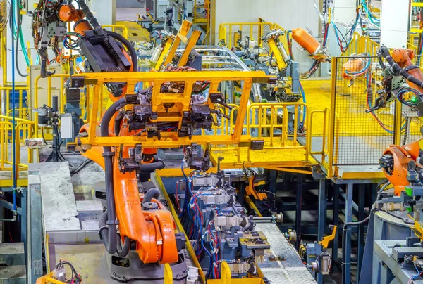 Γραμμή παραγωγής αυτοκινήτων το ρομπότ — Φωτογραφία Αρχείου