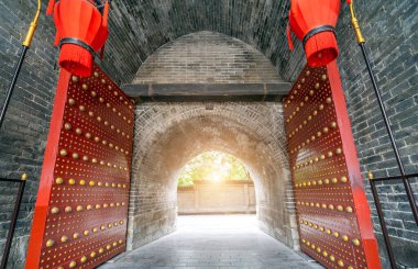 Xi'an City Wall is the largest and best-preserved ancient city wall in China. The picture shows one of the city gates. clipart