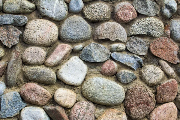 Πέτρινο Τοίχο Του Στρογγυλή Πέτρα Εμπρός Και Πίσω Φόντο Θολή — Φωτογραφία Αρχείου