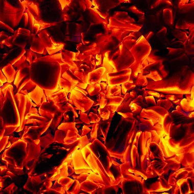 Parlayan sıcak kömürü briket yakın çekim arka plan dokusu