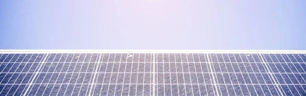 Close-up of solar panels installed in the desert to provide electricity to a remote meteorological base