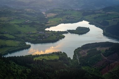 Urkulu reservoir from Orkatzategi mountain, Guipuzcoa, Spain clipart