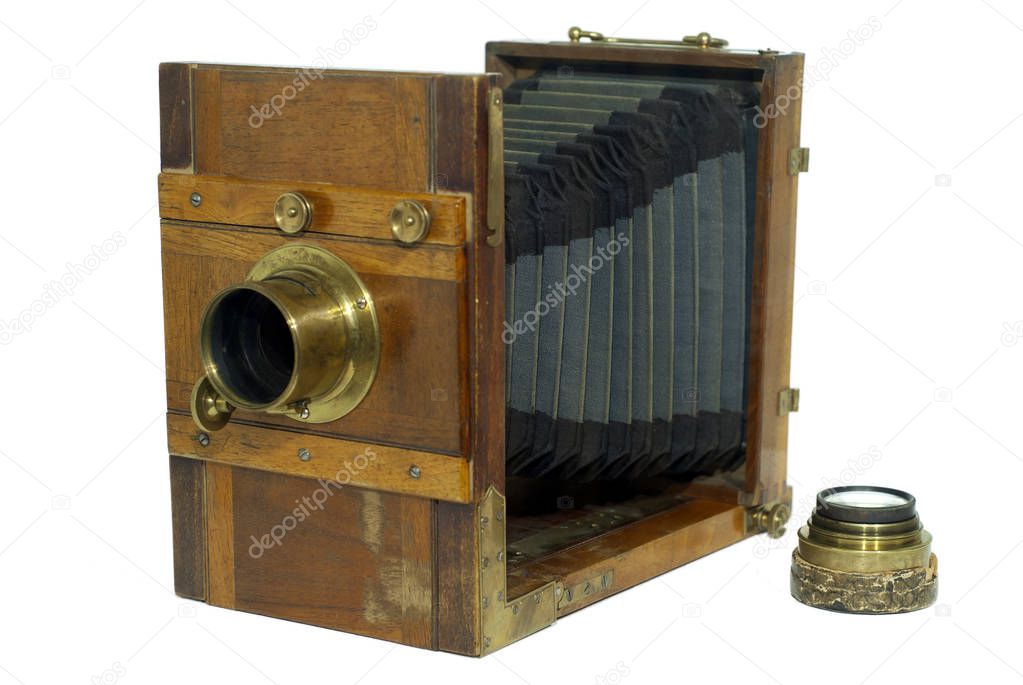 19th century folding photo camera, with bellows for focusing, isolated