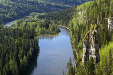 Landscape without sky - wooded canyon of the northern river with rocks, a top view (the Usva river in the Middle Urals, Russia) clipart