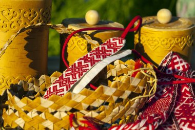 items of traditional Slavic folk crafts on the fair close-up clipart