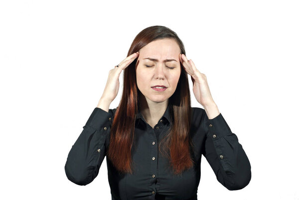the girl holds with both hands behind her head, suffering from a headache or saying "let me remember", on a white background

