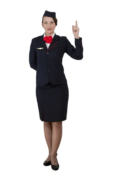 Stewardessa Pełni Wzrostu Białym Tle Stoi Pokazuje Palcem Wskazującym — Zdjęcie stockowe