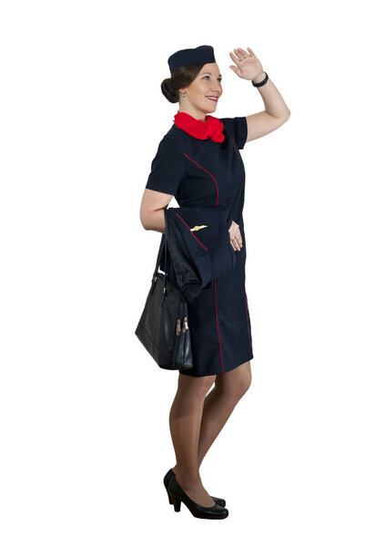 stewardess on white background smiling looking into the distance