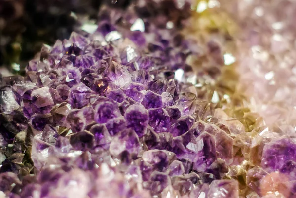 natural background - cluster of violet amethyst crystals