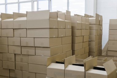 cardboard boxes in the packaging workshop clipart