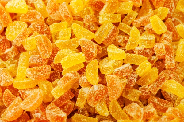 Fondo - gomitas translúcidas de color amarillo dorado en azúcar —  Fotos de Stock