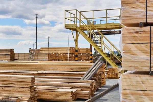 packaged and ready-to-pack freshly made boards in the yard of the woodworking production