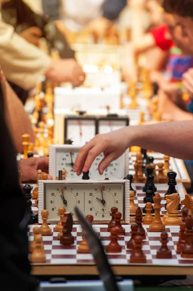 People playing chess in chess tournament