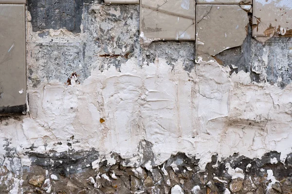 クローズアップ-家の古いファサードの灰色の石の壁 — ストック写真