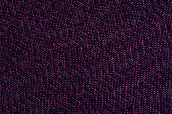 Close-up fragment of warm knitted purple hirts. Concept of warm everyday things. clothing store concept. Advertising space. Place for text