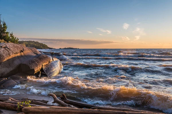 Colorful sunset above the water of Superior Lake, Canada