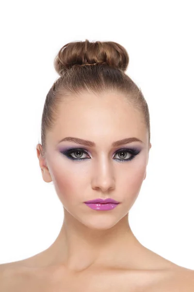 Young beautiful girl with hair bun and fancy makeup — Stock Photo, Image