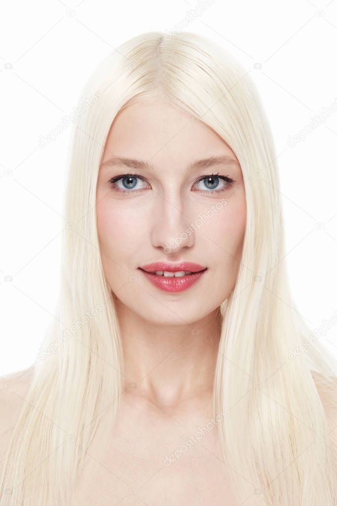 Close view portrait of young blonde woman with clean makeup isolated on white background 