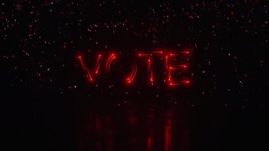 Düşen konfetilerle VOTE 'yi heceleyen modern çoklu renkli kovalamaca işareti ve sonunda 10 saniyelik döngü.