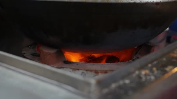 Close-up burning coal in a fire. Bright orange flame burning inside. 4k — Stock Footage Close-up burning coal in a fire. Bright orange flame burning inside. 4k Stock Video