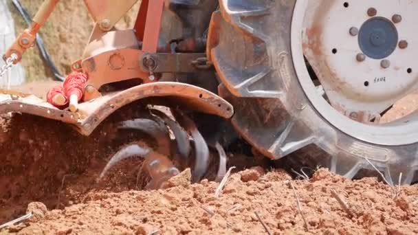 Tractor plowing the dusty arid soil and prepare the field for sowing. Organic farming. Agriculture and agribusiness. — Stock Video