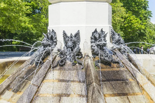 Fountain of Fallen Angel (Fuente del Angel Caido, by Ricardo Bellver, 1877) - highlight of Buen Retiro Park. Buen Retiro Park - Park of Pleasant Retreat - one of largest parks of Madrid City. Spain.