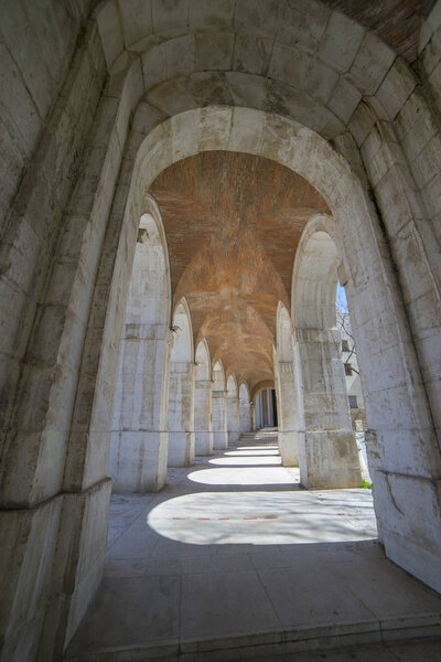 Passage Old arcs, architecture. A sight of the palace of Aranjuez (a museum nowadays), monument of the 18th century, royal residence Spain.