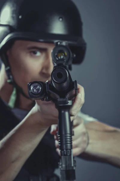 Warrior Paintball Sport Player Wearing Protective Helmet Aiming Pistol Black — Stock Photo, Image