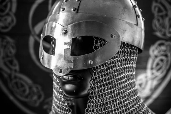 Antivirus or firewall concept, Viking warrior helmet with chainmail over silver shield