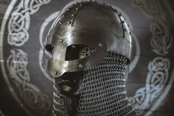 antivirus or firewall concept, Viking warrior helmet with chainmail over silver shield