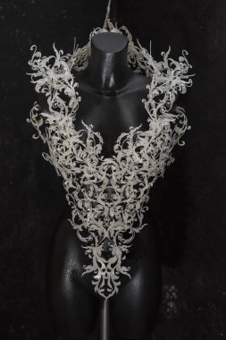 Piece made with 3d printer, is composed of white flowers that form a corset, handmade, fantasy design Baroque style clipart