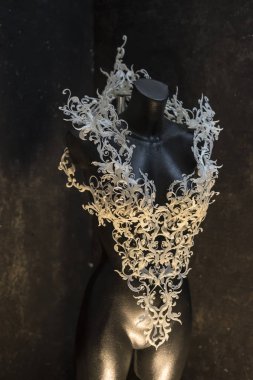 Piece made with 3d printer, is composed of white flowers that form a corset, handmade, fantasy design Baroque style clipart