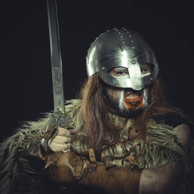 Savaş, Viking, kask ve savaş resimleri ile İskandinav savaşçı, bir kılıç ve hayvan derisi bir pelerin giyer
