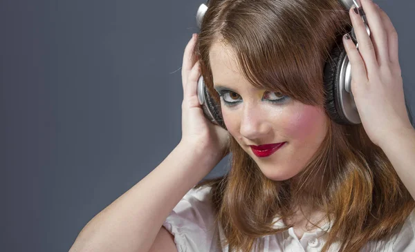 Teen Redhead Girl Listening Music Flat Gray Background — Stock Photo, Image