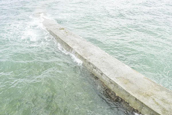 Artificial concrete breakwater on the beaches of Santander, Cant — Stock Photo, Image