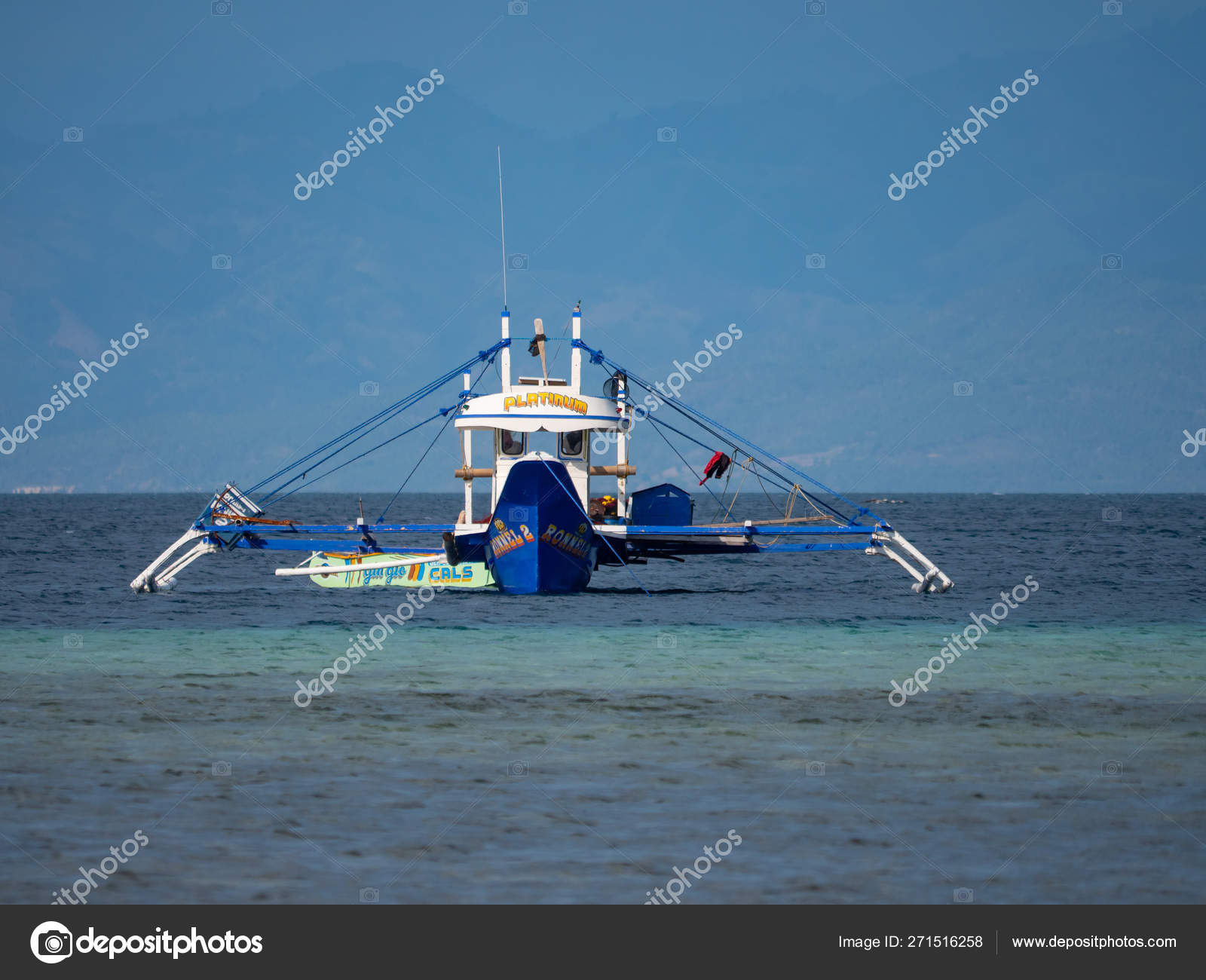 https://st4.depositphotos.com/1397350/27151/i/1600/depositphotos_271516258-stock-photo-outrigger-fishing-boat-in-the.jpg