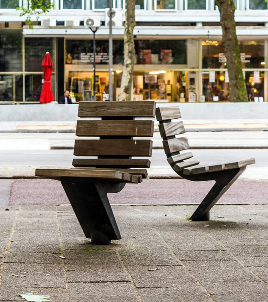 Practical and comfortable street furniture in Rotterdam, Netherlands. All these chairs can rotate on their axis and could be turned to any direction.