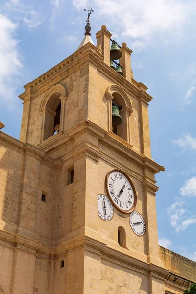 Bell tower of Saint John\'s Co-Cathedral in Valletta, Malta. It is a Roman Catholic cathedral built in the Mannerist style. Tower has three bells, large single-hand clock and two date and day dials.