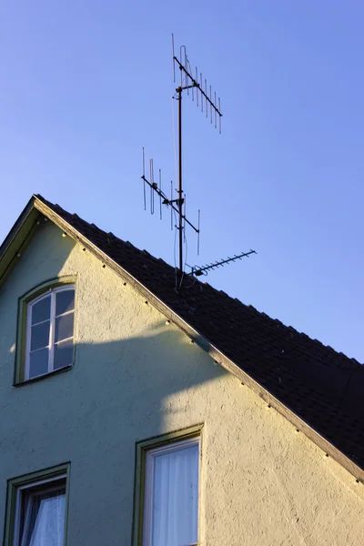 city building rooftop antenna in historical center of schwaebisch gmuend south germany autumn evening