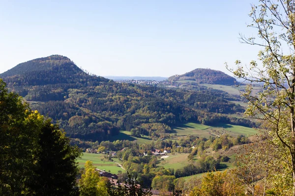 indian summer landscape mountains with colorful trees and forest in south germany countryside